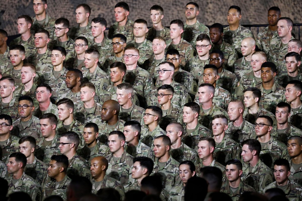 Soldiers from the 10th Mountain Division listen to Vice President Mike Pence at Wheeler-Sack Army Airfield at Fort Drum, N.Y., on Aug. 13, 2018. (Charlotte Cuthbertson/The Epoch Times)