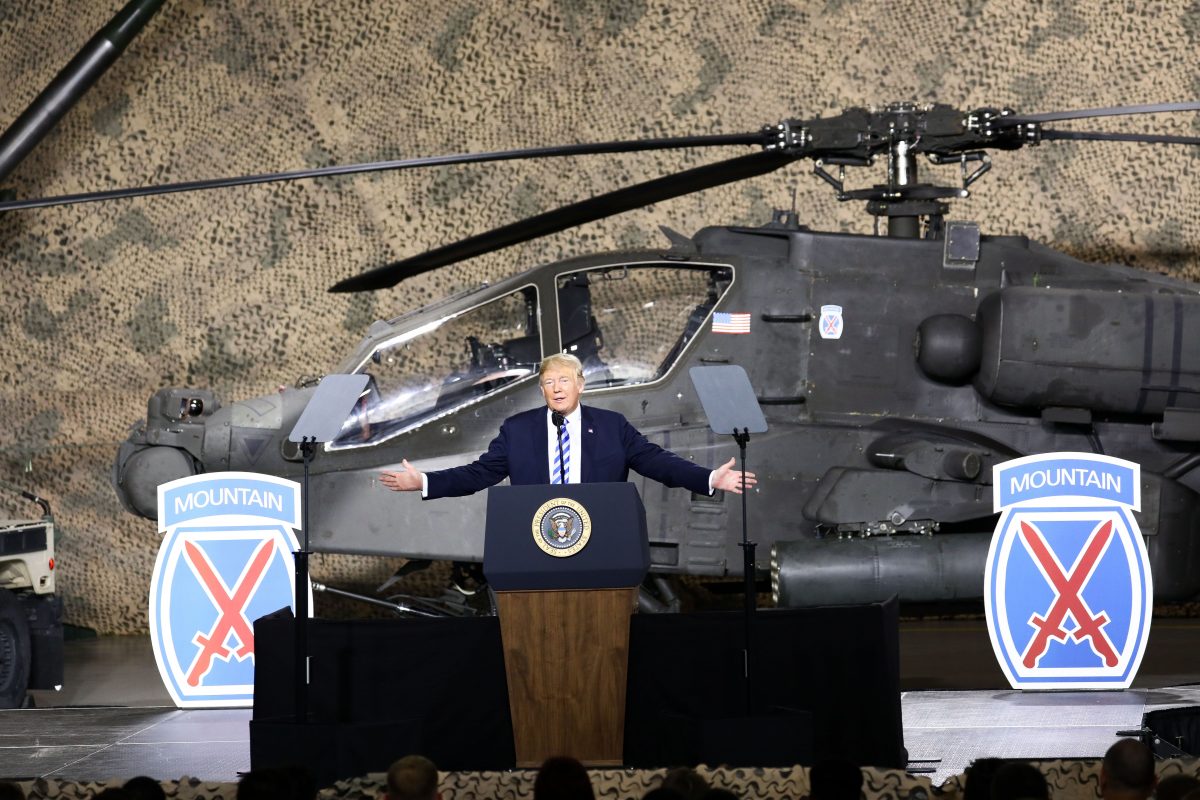 President Donald Trump speaks at Wheeler-Sack Army Airfield before signing the 2019 National Defense Authorization Act, at Fort Drum, N.Y., on Aug. 13, 2018. (Charlotte Cuthbertson/The Epoch Times)