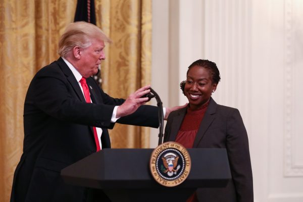 President Donald Trump thanks an ICE agent during the Salute to the Heroes of the ICE and CBP at the White House in Washington on Aug. 20, 2018. (Samira Bouaou/The Epoch Times)