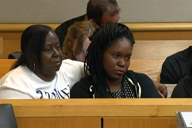 Britany Jacobs (R) attends the bail hearing
