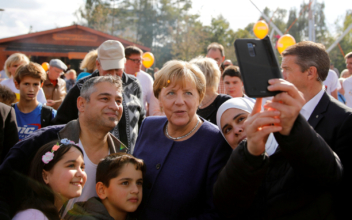 German Chancellor Angela Merkel Takes a Gamble With New Immigration Law
