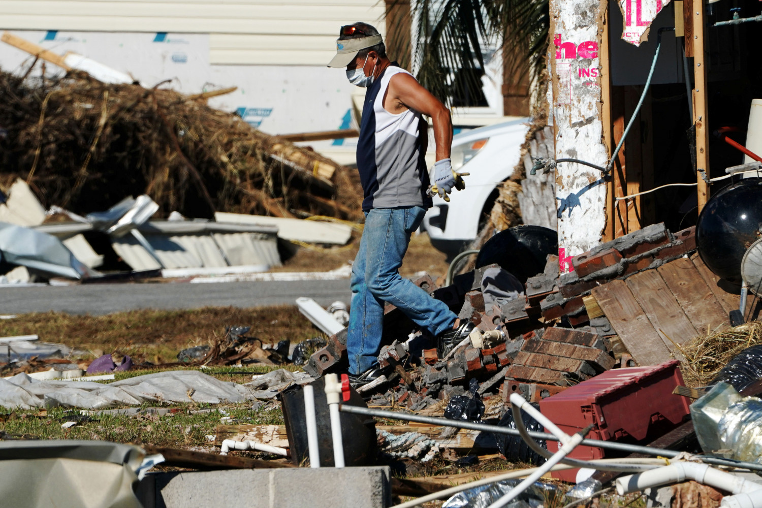 A man walks out of his home following Hurricane Michael in Mexico Beach, Florida, U.S., October 13, 2018. (Carlo Allegri/Reuters)