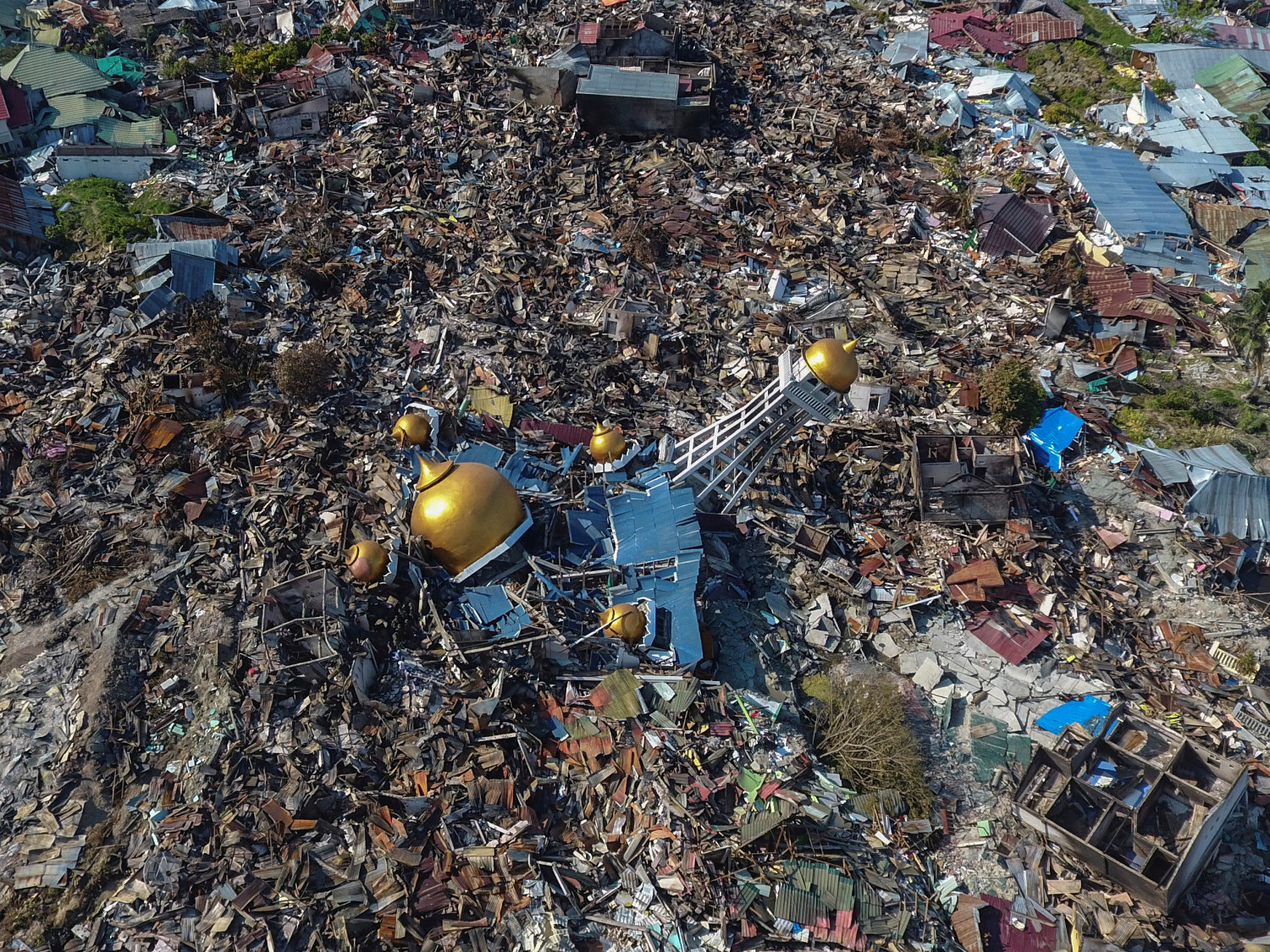 An aerial view of an area devestated by an earthquake in Palu, Central Sulawesi, Indonesia October 1, 2018. (Antara Foto/Hafidz Mubarak A/Reuters)