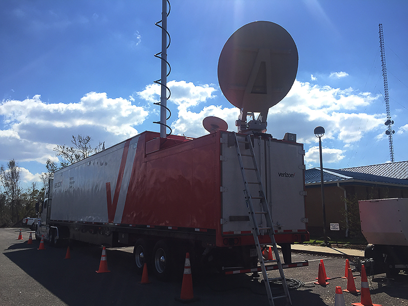 Verizon’s Big Red mobile cellular truck is parked in Bay County to provide cell service after Hurricane Michael. (Verizon.com)
