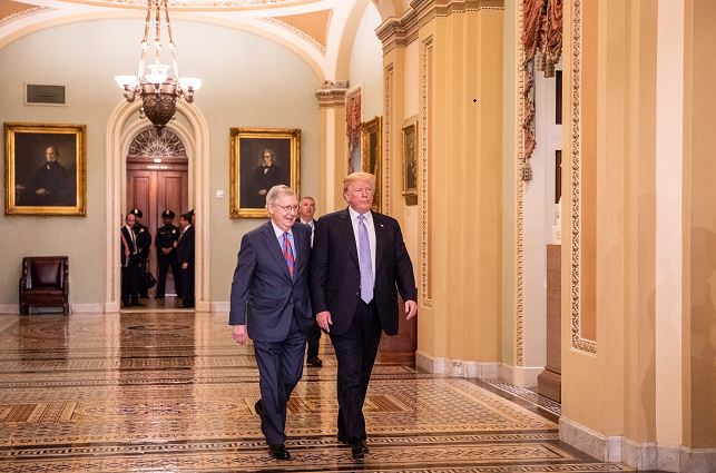 President Donald Trump and Senate Majority Leader Mitch McConnell arrive for the Senate Republican policy lunch at the U.S. Capitol in Washington on May 15, 2018. (Samira Bouaou/The Epoch Times)