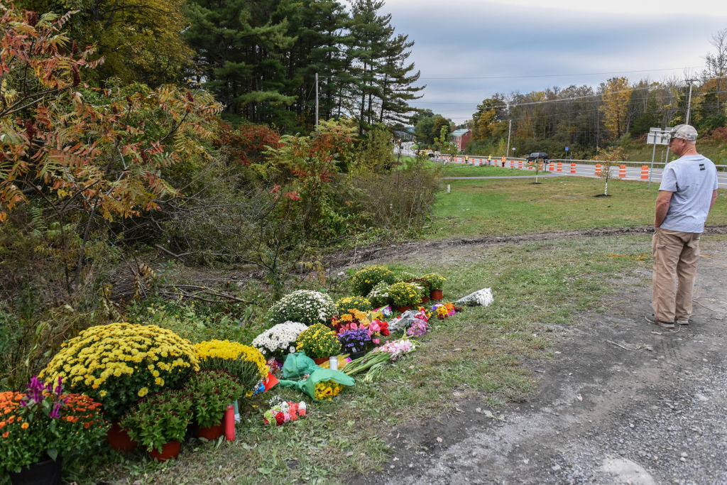 A mourner looks on at the site of the fatal limousine crash in Schoharie, N.Y., on Oct. 8, 2018. (Stephanie Keith/Getty Images)