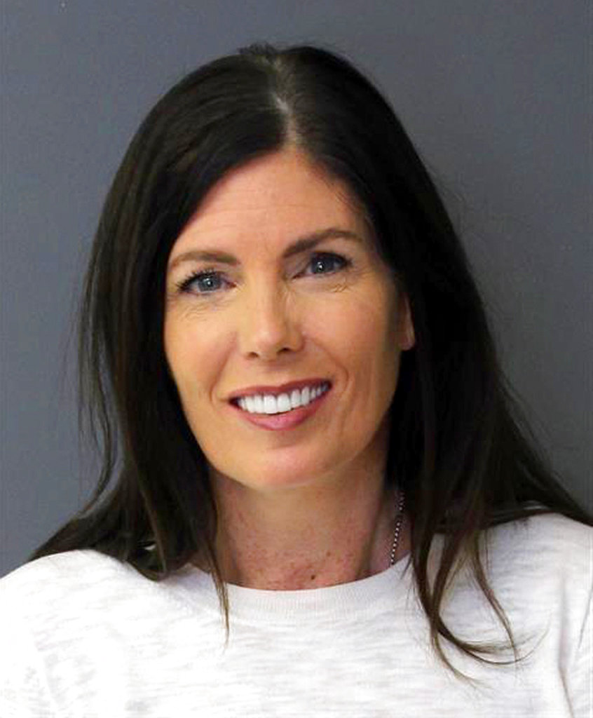 This booking photo provided by the Montgomery County Correctional Facility in Eagleville, Pa., shows former Pennsylvania Attorney General Kathleen Kane. Kane reported early 0n Nov. 29, 2018, to the suburban Philadelphia county jail to begin serving a sentence for leaking grand jury material and lying about it. (Montgomery County Correctional Facility via AP)