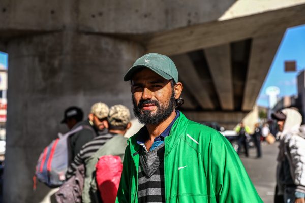 Honduran migrant Frank Martinez stands near the Chaparral port of entry to the United States in Tijuana, Mexico, on Nov. 23, 2018. (Charlotte Cuthbertson/The Epoch Times)