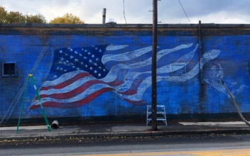 Pizza Parlor’s Flag Mural Defaced After Antifa Protest