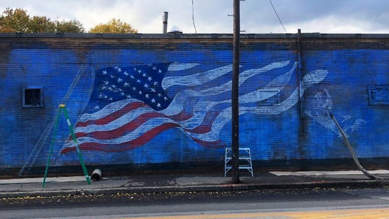 Pizza Parlor’s Flag Mural Defaced After Antifa Protest