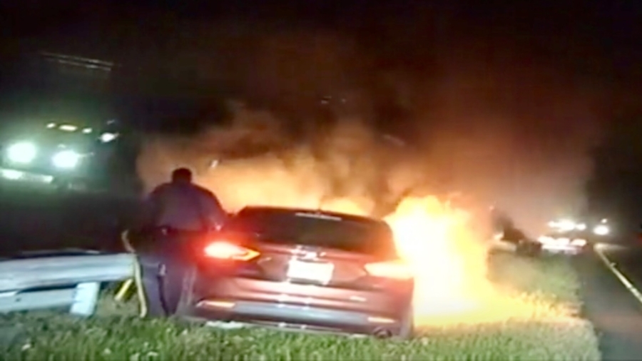 State Police Drag Man Out of Burning Car