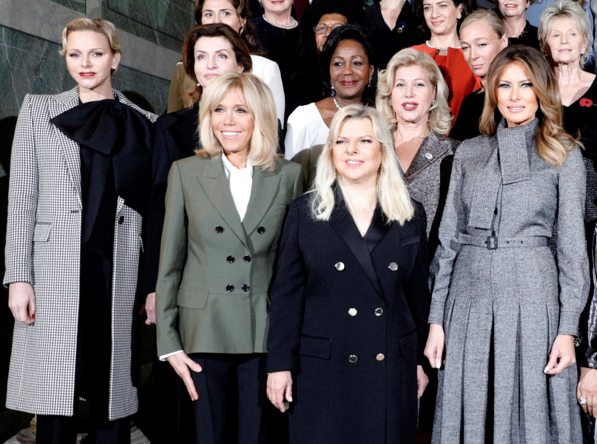 Princess Charlene of Monaco (L), French President Emmanuel Macron's wife Brigitte Macron, Israeli Prime Minister Benjamin Netanyahu's wife Sara and First Lady Melania Trump (R), pose for a photograph with other leaders's companions as they take part in a spousal event at the Chateau de Versailles [Palace of Versailles] in Versailles, outside Paris, on Nov. 11, 2018. (Kamil Zihnioglu/AFP/Getty Images)