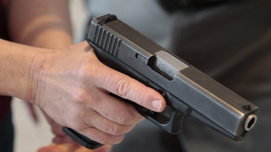 Mother Holds Intruder at Gunpoint for 13 Minutes While Waiting for Police