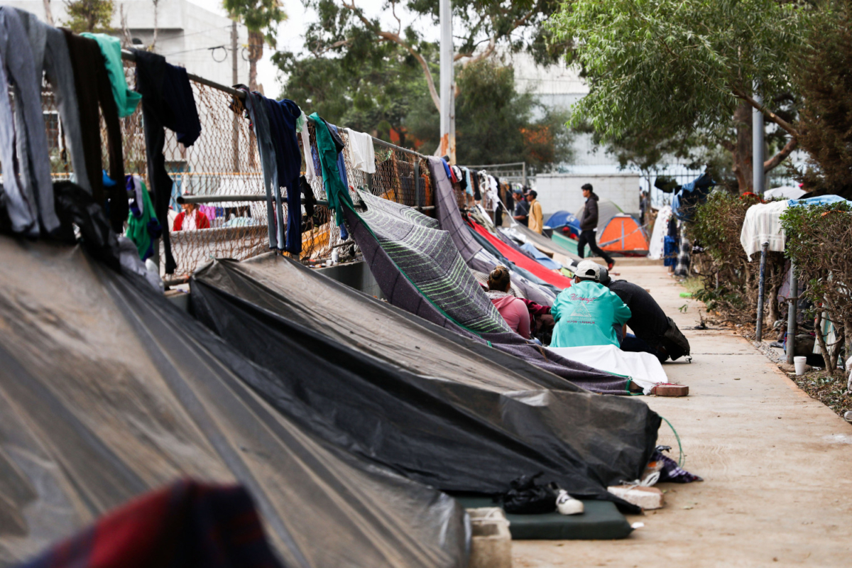 Members of the Central American migrant caravan camp out at a municipal sports complex in Zone Norte near the U.S.-Mexico border in Tijuana, Mexico, on Nov. 19, 2018. (Charlotte Cuthbertson/The Epoch Times)