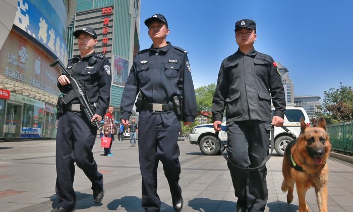 China Subjects Police to Points System to Arrest People of Faith