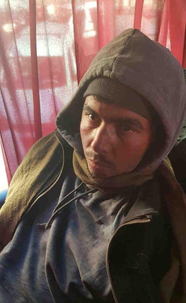 Another of the arrested suspects. The suspects reportedly tried to hide knives and a slingshot under their bus seats when they were arrested. Photo provided on Dec. 20, 2018. (2M.ma via AP)