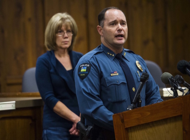Woodland Park Police Chief Miles De Young answers questions about the disappearance of resident Kelsey Berreth, 29, while her mother, Cheryl Berreth, stands in the background during a news conference at City Hall in Woodland Park, Colo. (Christian Murdock/The Gazette via AP, File)