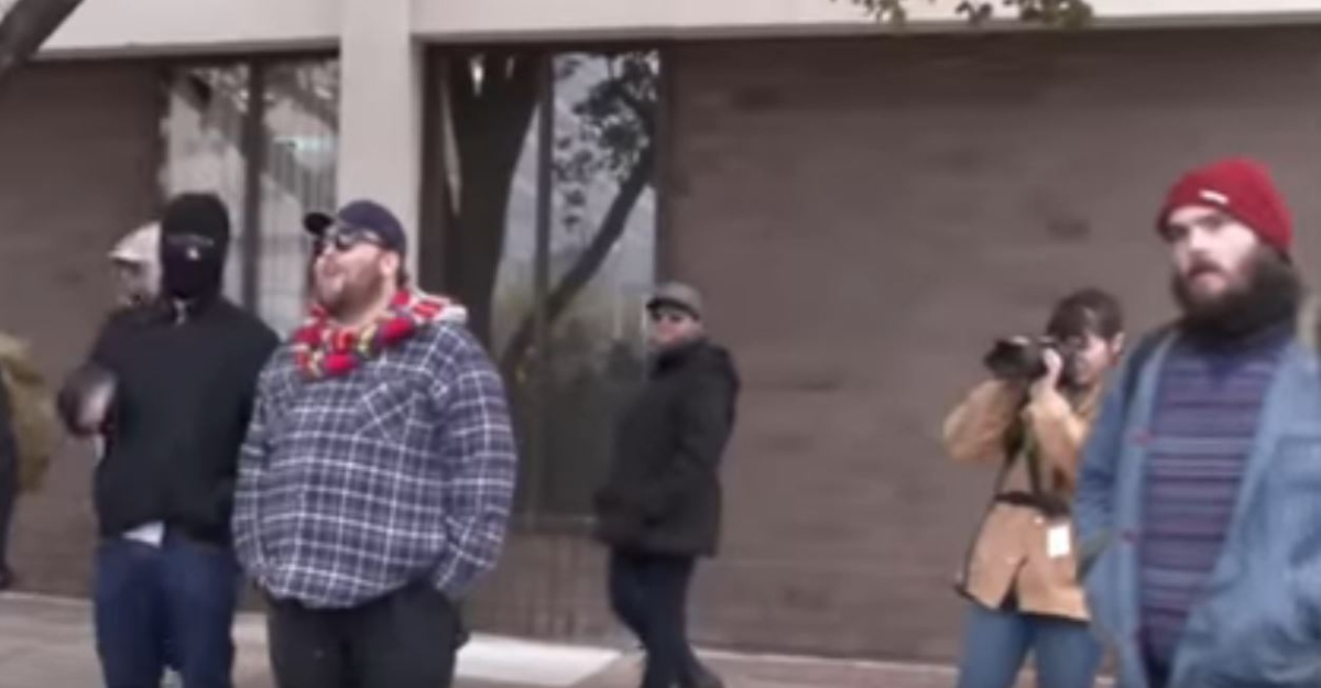 Antifa members Tom Keenan, second from left, and Thomas Massey, right, on a street in Philadelphia on Nov. 17, 2018. (Philadelphia Police Department)