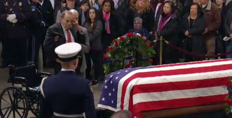 Former Republican Sen. Bob Dole was seen being helped out of his wheelchair to pay his respects to the late former President George H.W. Bush on Dec. 4. (CNN)
