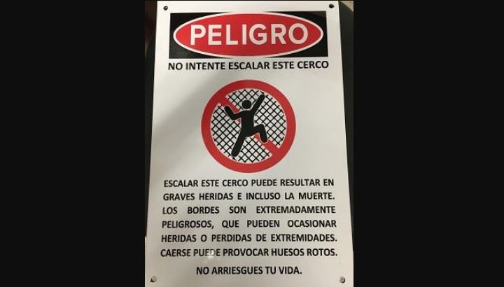 A sign warning people not to cross the border wall in an undated photo. (U.S. Customs and Border Protection)