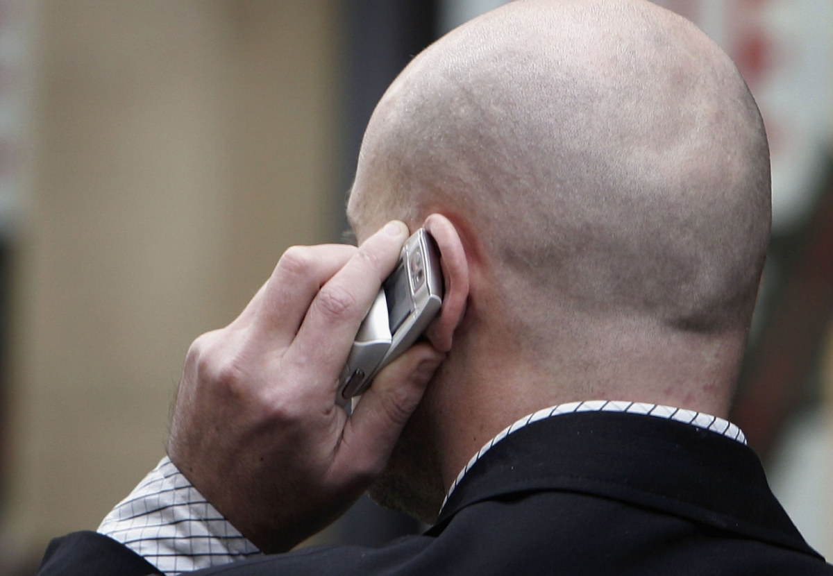 An unidentified man uses his cellphone in a file photo. (Christopher Furlong/Getty Images)
