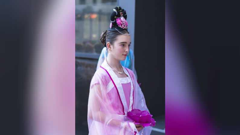 A girl dressed as a celestial maiden from the Falun Gong community is pictured before the Christmas Pageant in Perth, Australia, on Dec. 1, 2018. (Sam Lin/The Epoch Times)
