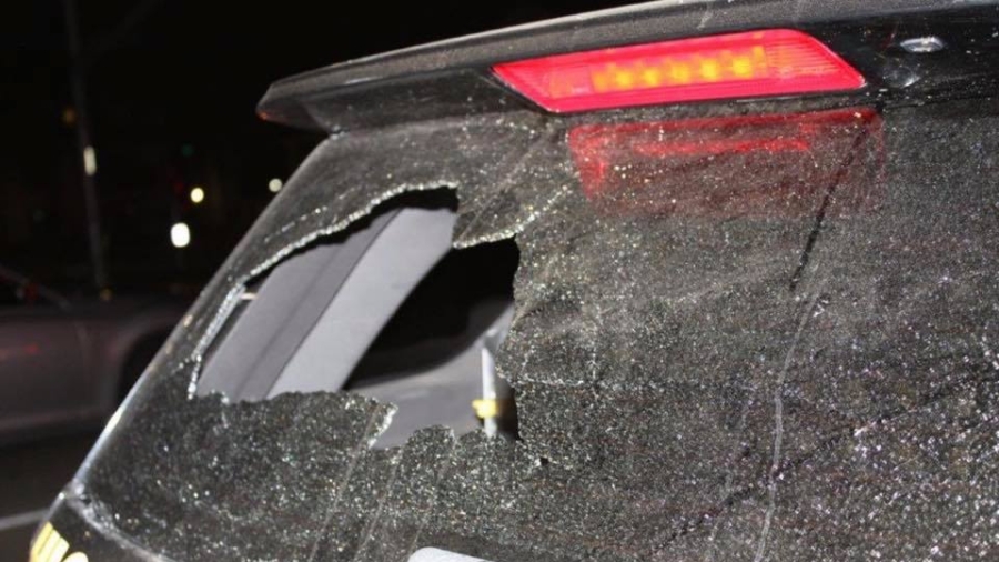 Passing Motorist Throws Full Beer Bottle Through Police Patrol SUV Window