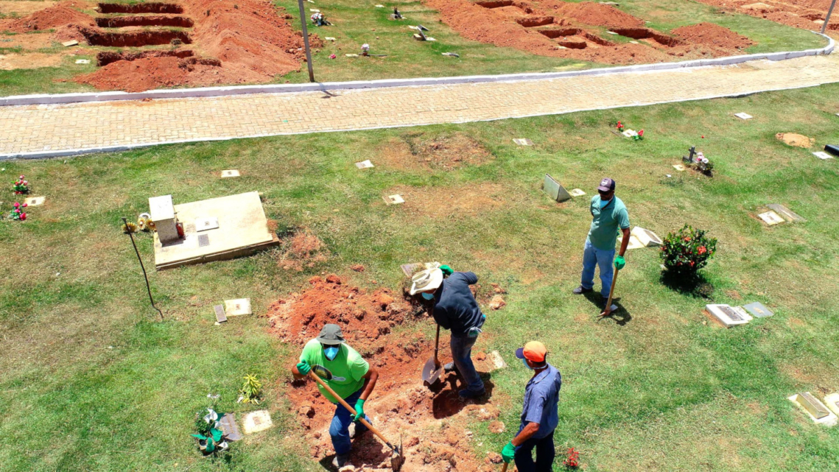 Cemetery workers prepare burial sites for the victims from the collapsed dam in Brumadinho, Brazil, on Jan. 29, 2019. (Andre Penner/AP)