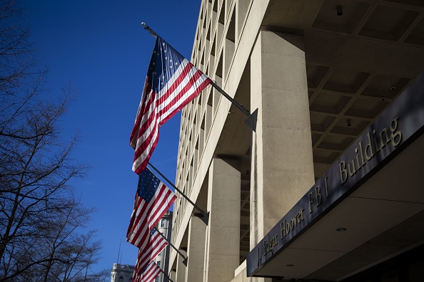 American flags fly outside the Federal Bureau of Investigation (FBI) headquarters in Washington on Jan. 22, 2019. (Al Drago/Bloomberg via Getty Images)