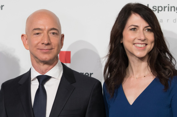 Amazon CEO Jeff Bezos and his wife MacKenzie Bezos pose at the headquarters of Axel-Springer in Berlin, Germany, on April 24, 2018. (Jorg Carstensen/AFP/Getty Images)