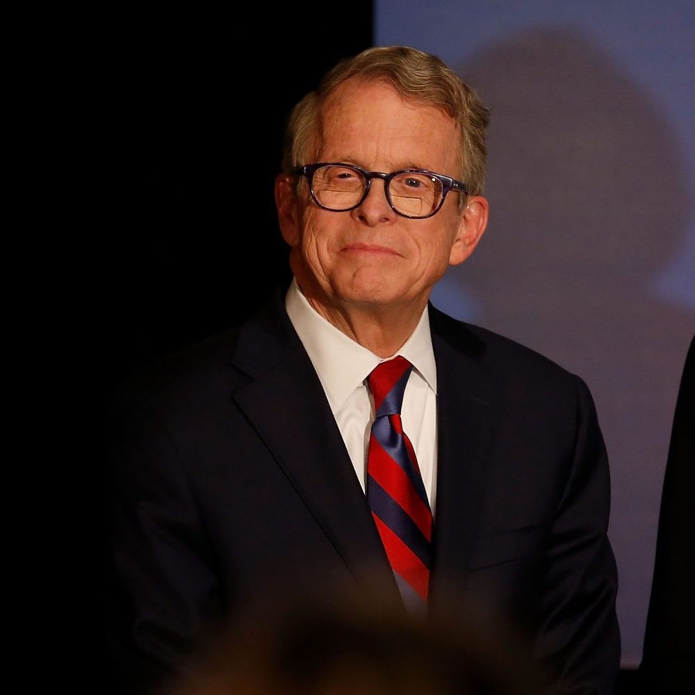 Republican Gubernatorial Candidate Ohio Attorney General Mike DeWine listens as Governor John Kasich gives a speech endorsing DeWine ahead of elections during a campaign event at the Boat House at Confluence Park in Columbus, Ohio, on Nov. 2, 2018. (Kirk Irwin/Getty Images)
