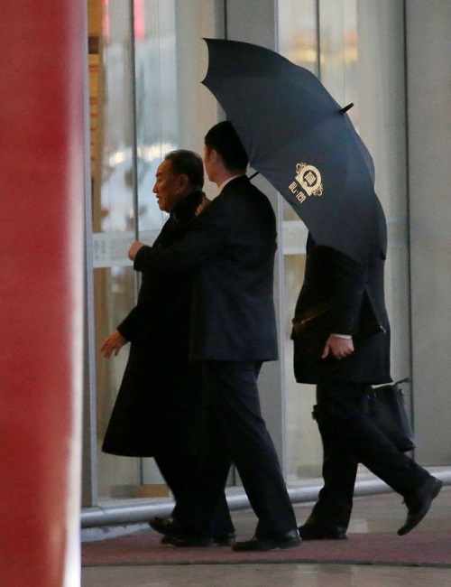 Senior North Korean official Kim Yong Chol (L) arrives at the international airport as he leaves for Washington from Beijing, China, on Jan. 17, 2019. (Jason Lee/Reuters)