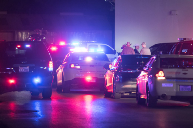Law enforcement personnel work at the scene of a shooting where five Houston police officers were reported shot in Houston, Texas on Jan. 28, 2019. (Loren Elliott/Getty Images)
