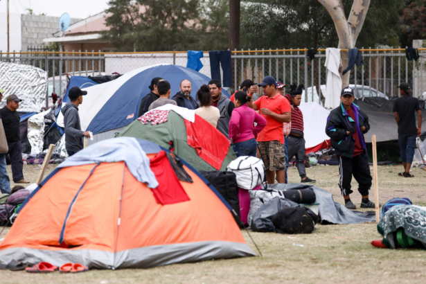 Members of the Central American migrant caravan camp out at a municipal sports complex in Zone Norte near the U.S.-Mexico border in Tijuana, Mexico, on Nov. 19, 2018. (Charlotte Cuthbertson/The Epoch Times)