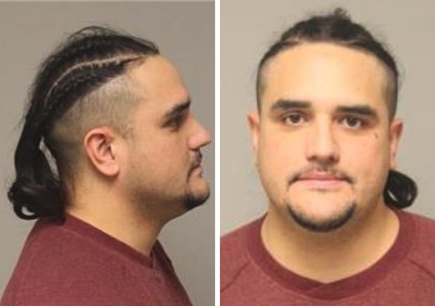 Justin Kaneakua is seen here in an undated booking photo. (Anoka County Sheriff's Office)