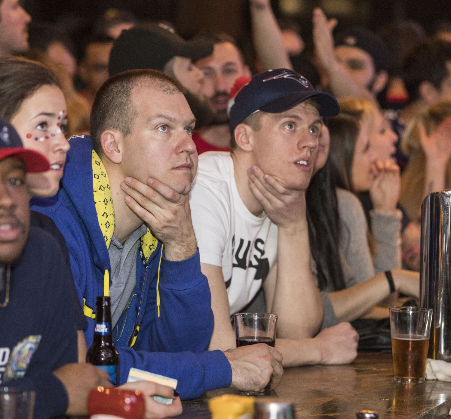New England Patriots fans react as the Philadelphia Eagles pull ahead near the end of the of Superbowl LII on February 4, 2018 in Boston, Massachusetts. (Scott Eisen/Getty Images)