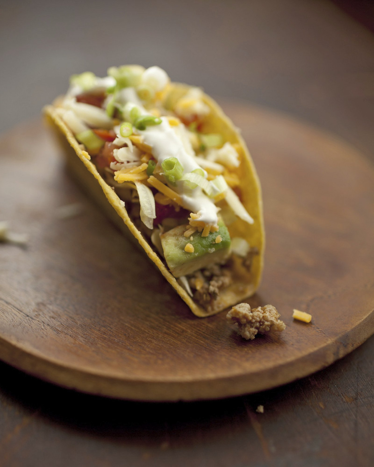 This 2012 photo provided by Katie Workman shows a taco created from a taco bar at a home in New York. A taco bar or spread is a great interactive way to feed a crowd for the Super Bowl. (Todd Coleman/Katie Workman via AP)