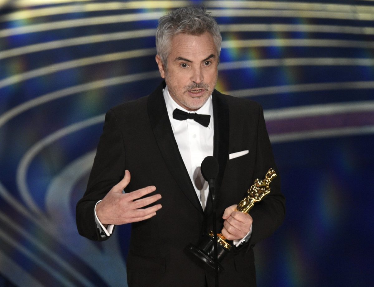 Alfonso Cuaron accepts the award for best cinematography for "Roma" at the Oscars at the Dolby Theatre in Los Angeles, on Feb. 24, 2019, (Chris Pizzello/Invision/AP)