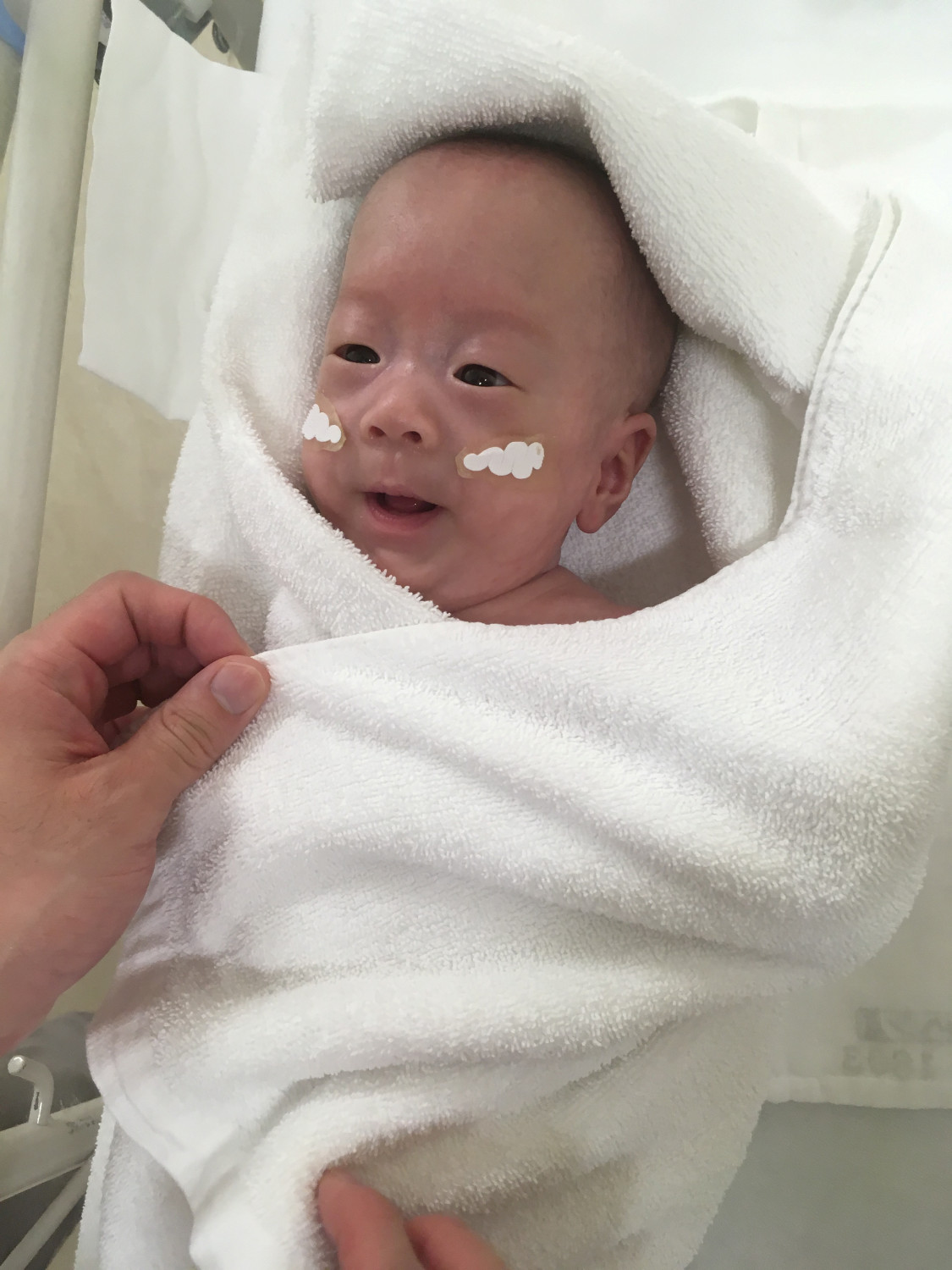 A baby boy weighing 268 grams when born in August 2018 in a handout image obtained on Feb. 27, 2019. (Keio University School of Medicine, Department of Pediatrics/Handout via Reuters)