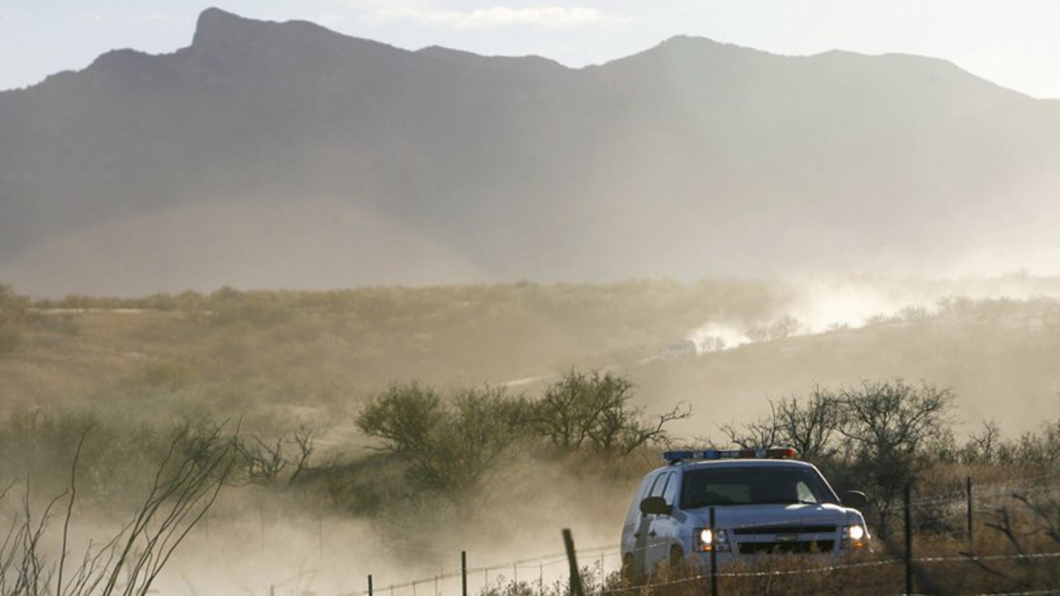 A United States Border Patrol vehicle returns from the scene of an overnight shootout where Border Patrol Agent Brian Terry was killed northwest of Nogales, Ariz. on Dec. 15, 2010. (Greg Bryan/Arizona Daily Star via AP, File)