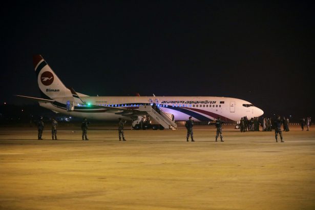 <br/>Security personnel outside the hijacked aircraft of the Biman Bangladesh Airlines at Shah Amanat International Airport in Chattogram, Bangladesh Feb. 24, 2019. (Stringer/Reuters)