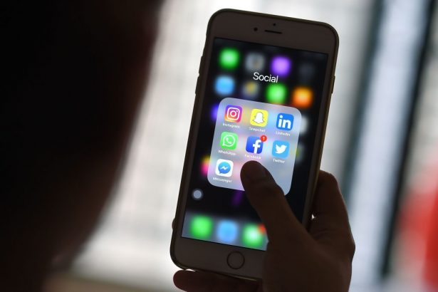Social media applications on a phone in a file photo. (Manan Vatsyayana/AFP/Getty Images)