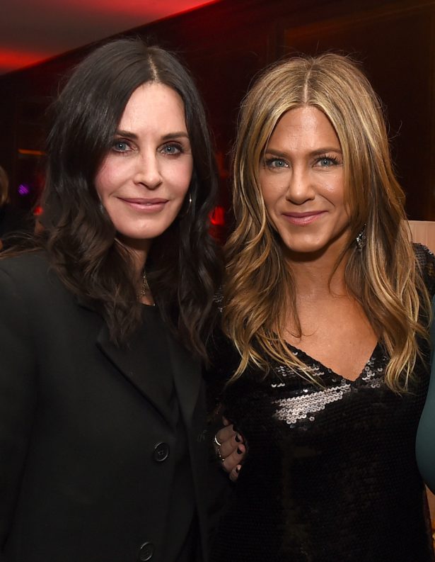 Courteney Cox (L) and Jennifer Aniston pose at the after party for the premiere of Netflix's "Dumplin'" at Sunset Tower in Los Angeles, Cal., on Dec. 6, 2018. (Kevin Winter/Getty Images)