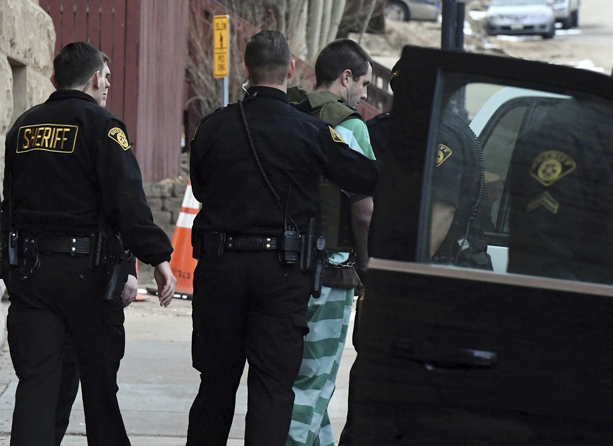 Patrick Frazee is escorted to an awaiting SUV after a hearing at the Teller County Courthouse in Cripple Creek, Colo., on Feb. 19, 2019. (Jerilee Bennett/The Gazette via AP)