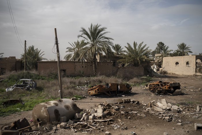 Damaged cars sit in an area recently retaken by U.S.-backed Syrian Democratic Forces (SDF) from ISIS terrorists in Susah, Syria, on Feb. 16, 2019. (Felipe Dana/AP Photo)