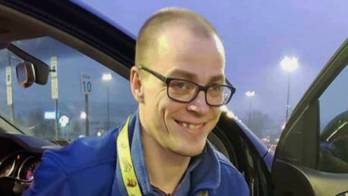 Adam Catlin gets out of a car before starting his shift at a Walmart in Selinsgrove, Pa., Dec. 14, 2018. (Holly Catlin via AP)