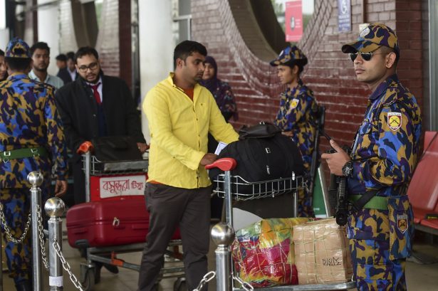 Bangladeshi security personnel at the Hazrat Shahjalal International Airport in Dhaka on Feb. 25, 2019. (Munir Uz Zaman/AFP/Getty Images)