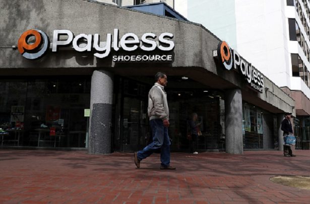 A pedestrian walks by a Payless Shoe Source store in San Francisco, California, on April 5, 2017. (Photo by Justin Sullivan/Getty Images)