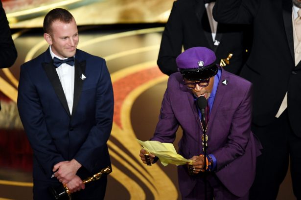 Spike Lee speaks after winning the best script award for "Blackkklansman" as co-writer Charlie Wachtel looks on at the Dolby Theatre in Hollywood, Calif., on Feb. 24, 2019. (Kevin Winter/Getty Images)