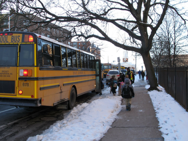 Students board a bus after being dismissed from the Dr. Ramon Betances Elementary School in Hartford, Conn. on Jan. 31, 2019. (AP Photo/Dave Collins)